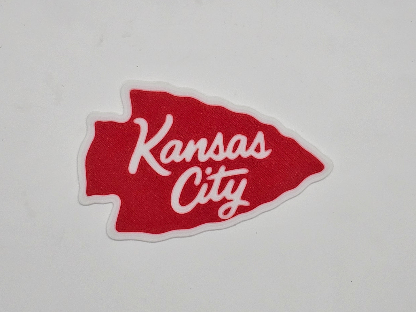 Red and white Kansas City arrowhead magnet