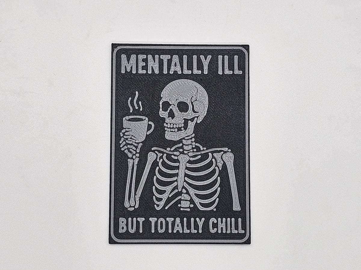 Charcoal and gray Mentally Ill but Totally Chill skeleton coffee magnet