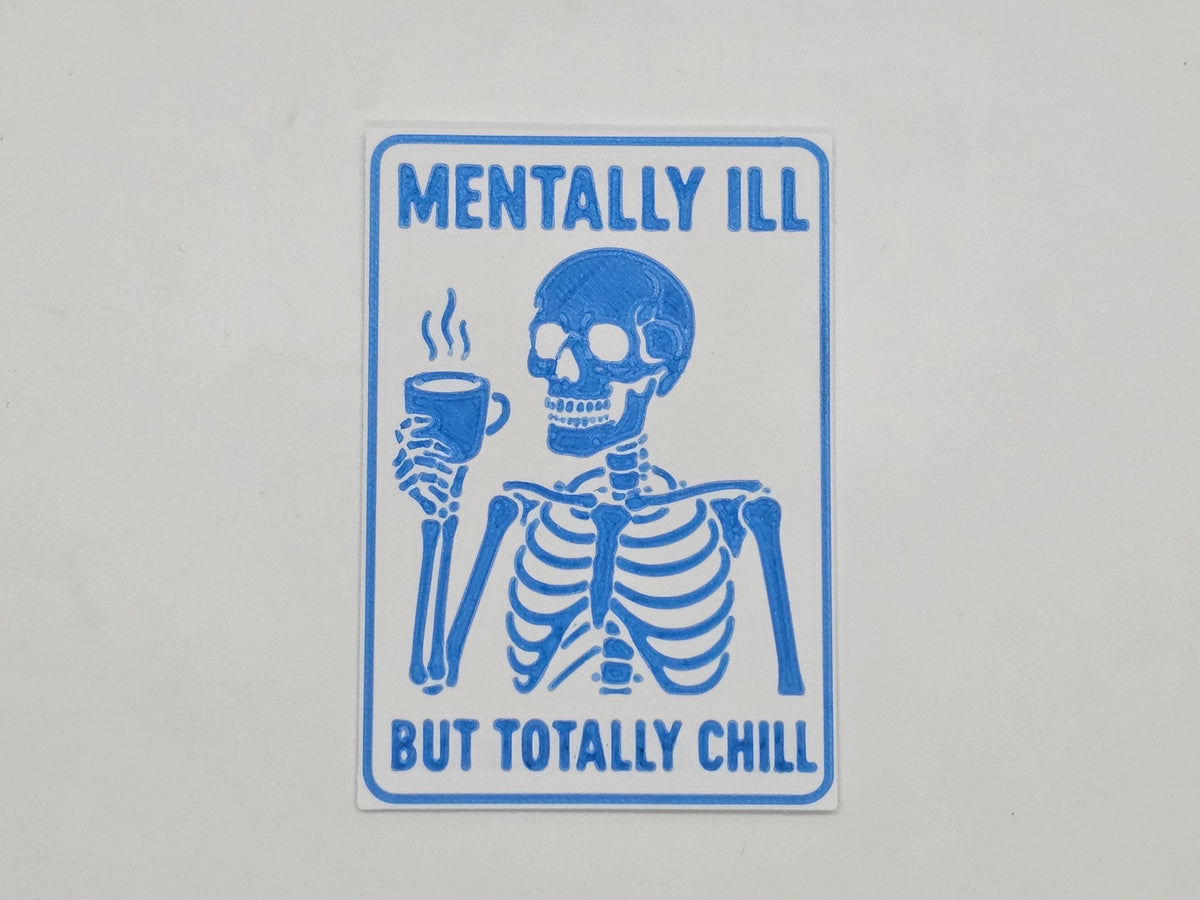 White and light blue Mentally Ill but Totally Chill skeleton coffee magnet
