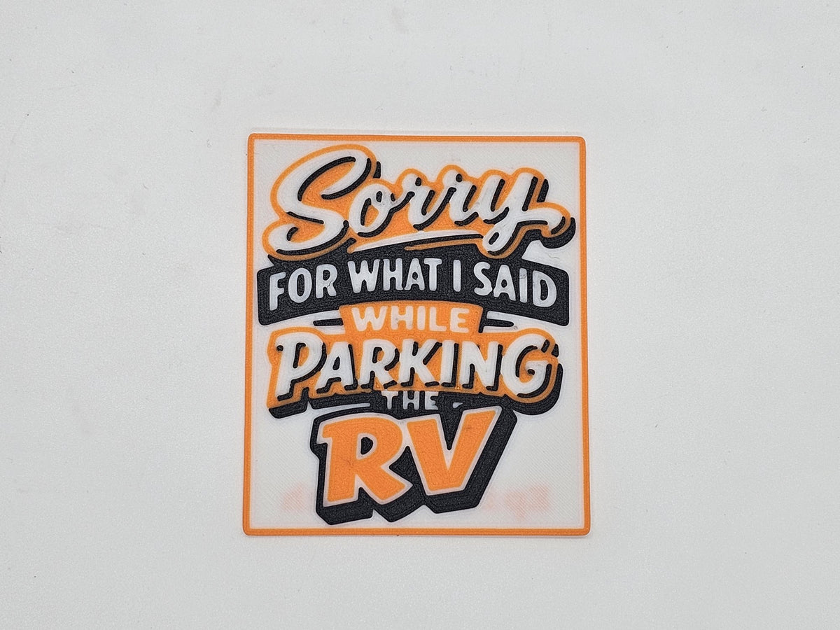White, black, and orange Sorry for What I Said While Parking the RV magnet