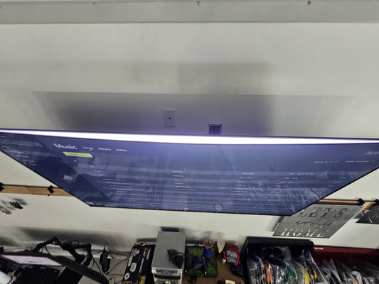 Backlight leaking through a separated Samsung Crystal UHD TV screen, lighting up the ceiling