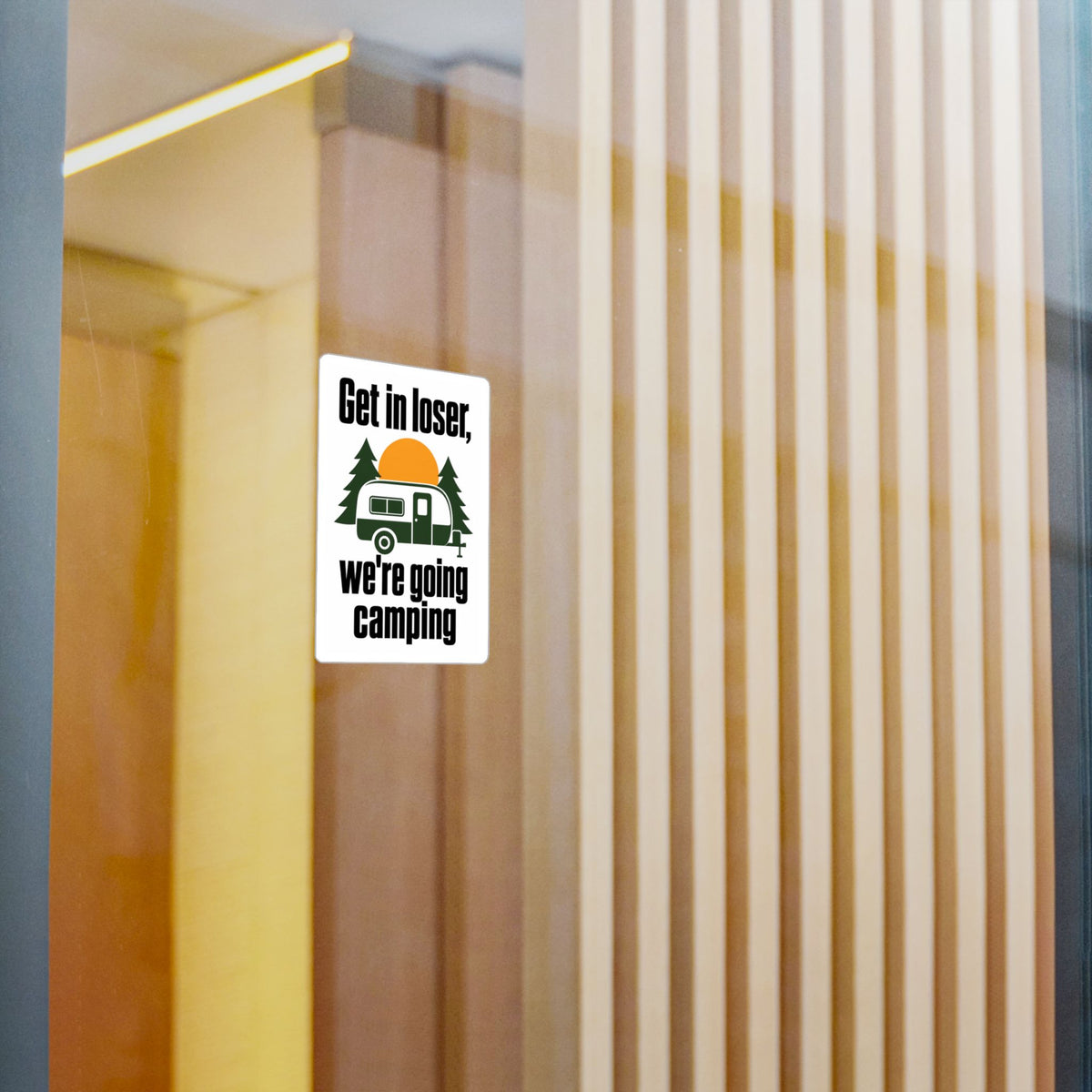 Get In Loser We're Going Camping RV vinyl sticker applied to a glass door