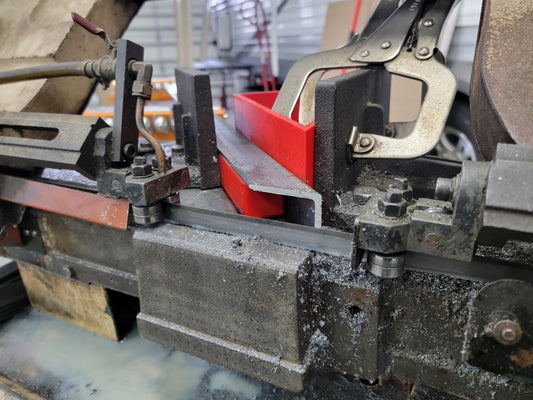 45 degree clamp-on jig for horizontal band saw