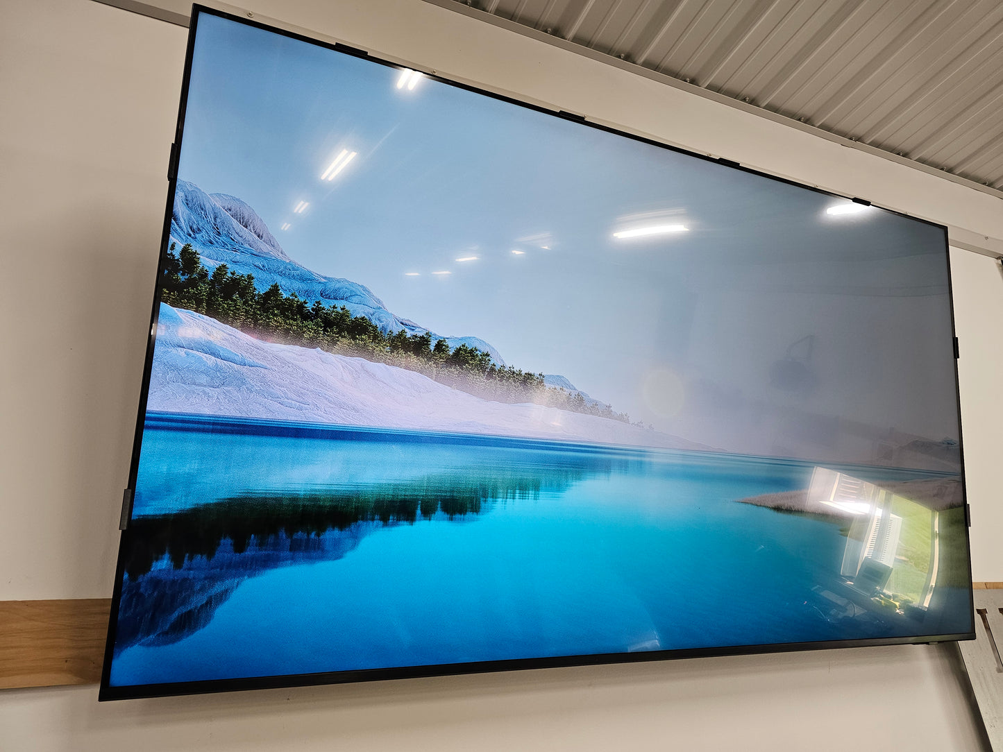 Samsung Crystal UHD 4K TV screen with screen retention repair clips installed