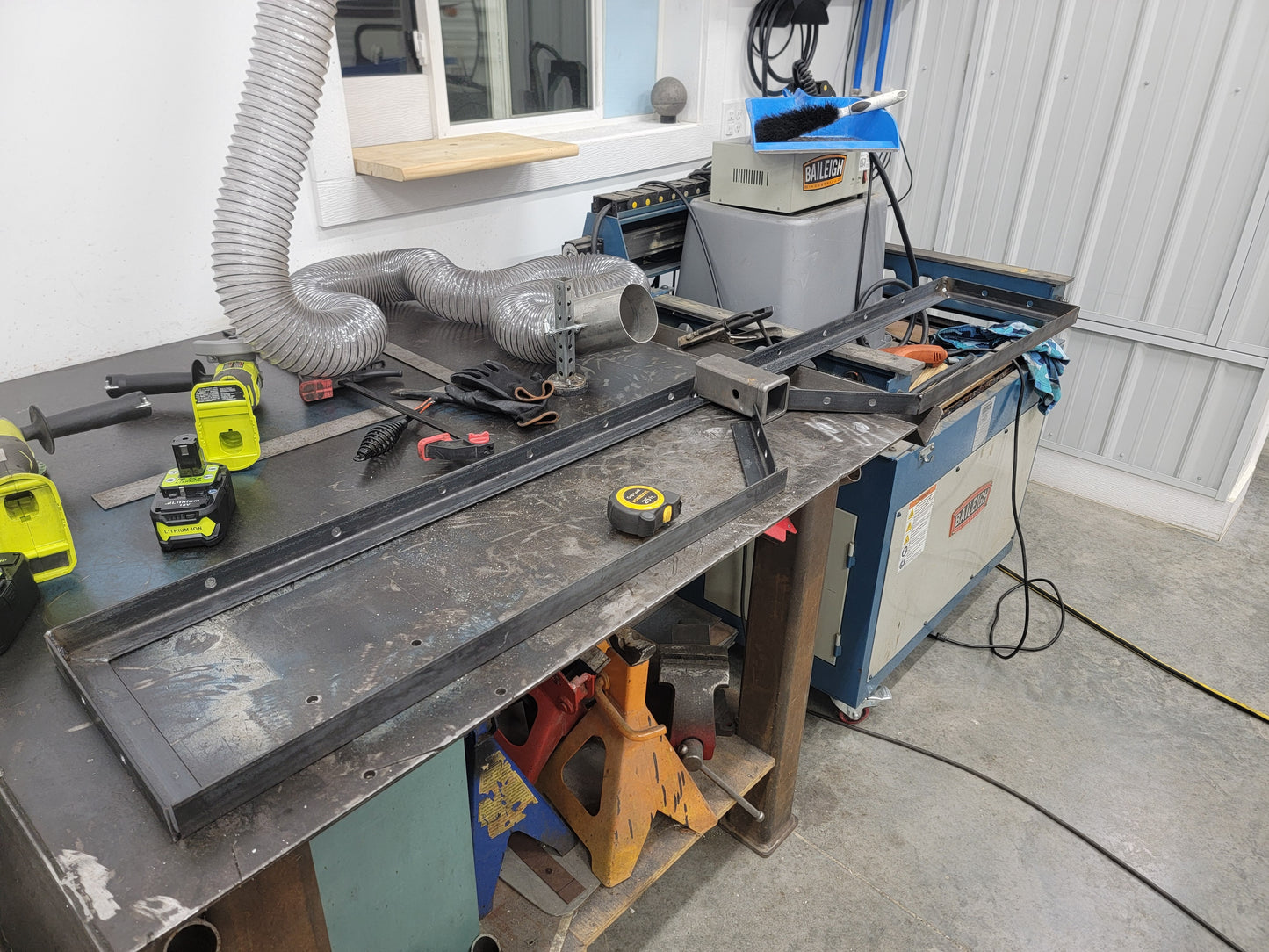 Custom RV rear bumper rack with receiver hitch bike mount.