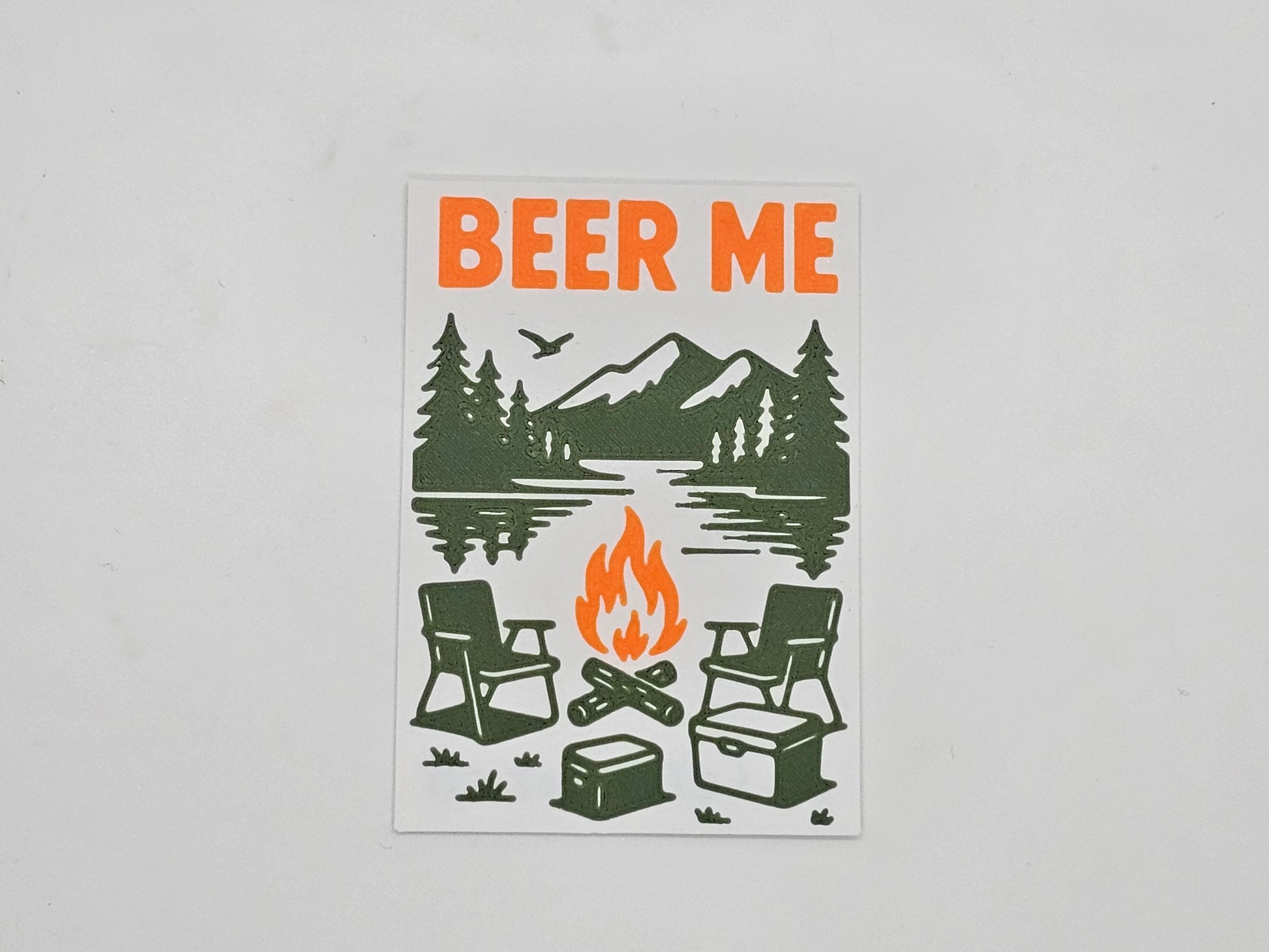 Orange, green, and white Beer Me campfire camping magnet