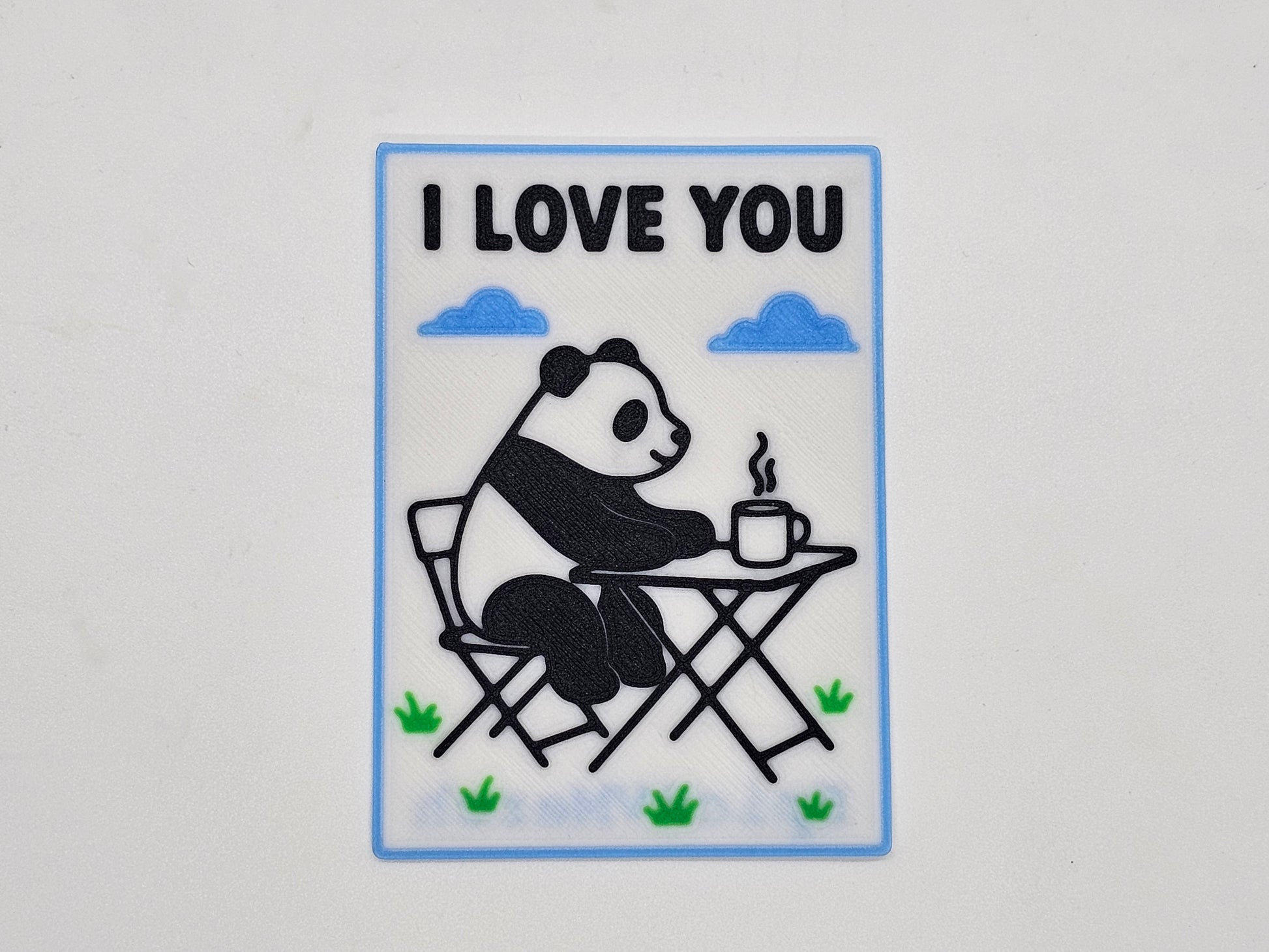 I Love You panda camping magnet with coffee at a camp table