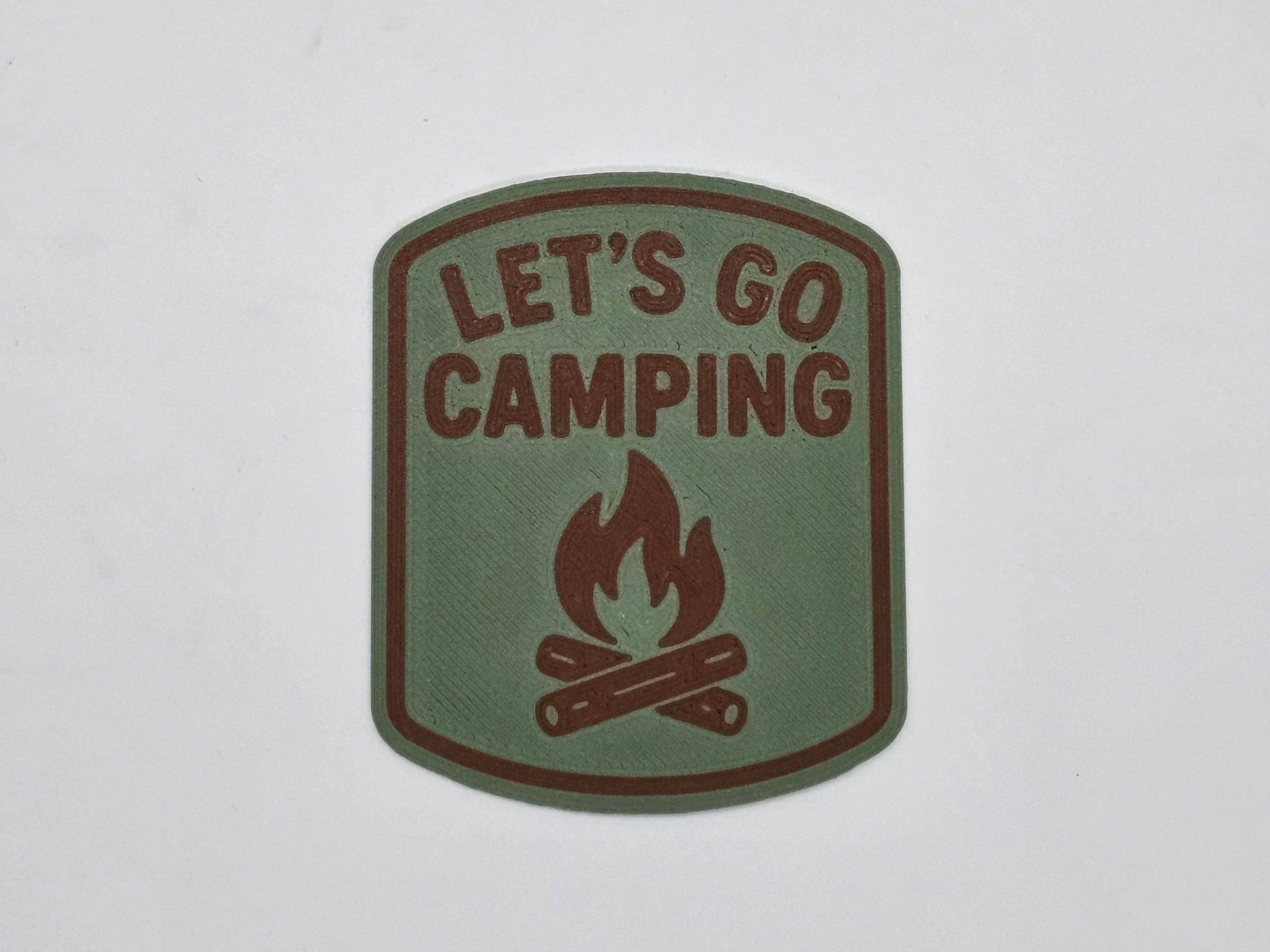 Olive and rust Let's Go Camping campfire RV magnet