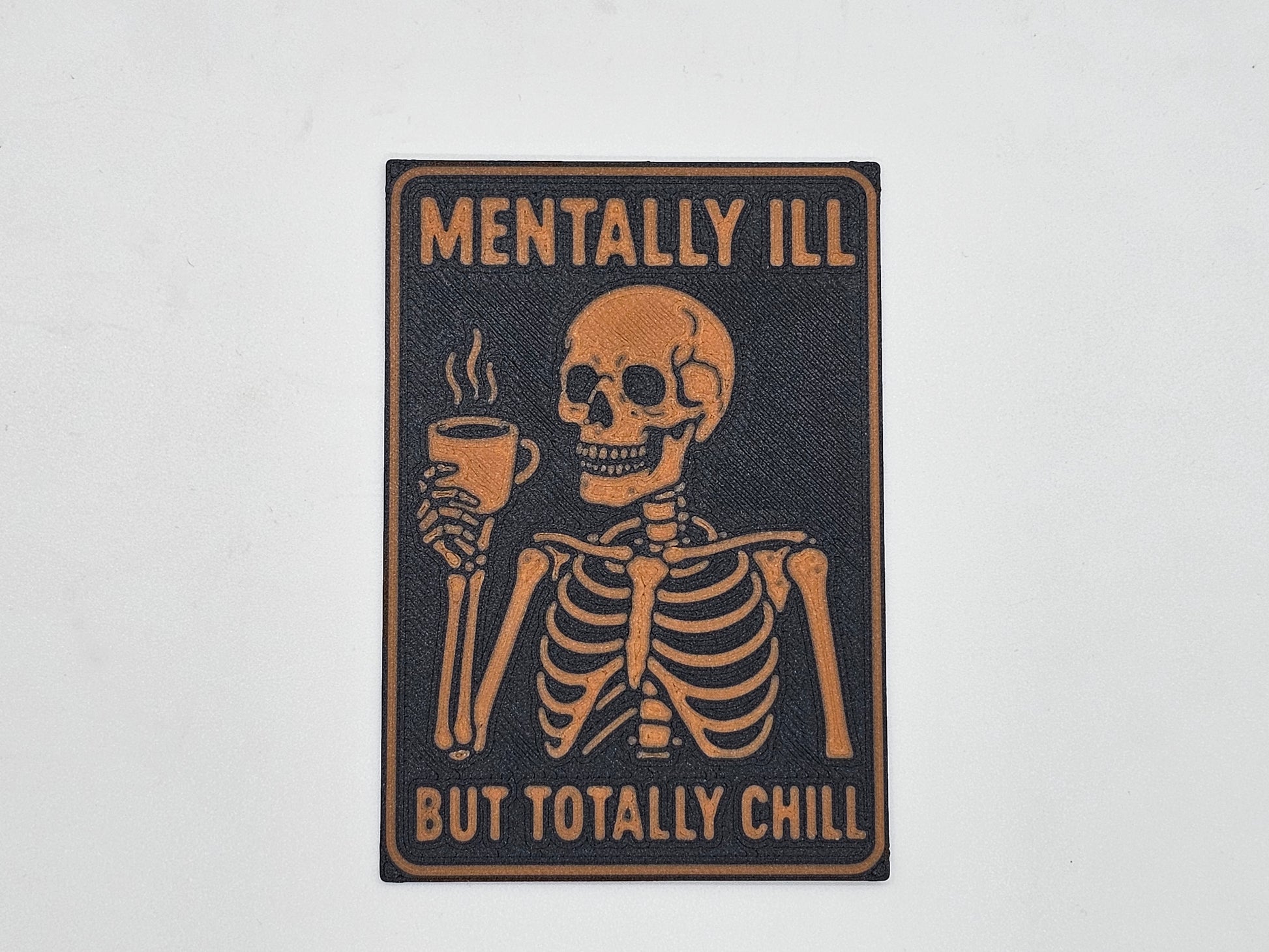 Black and tan Mentally Ill but Totally Chill skeleton coffee magnet