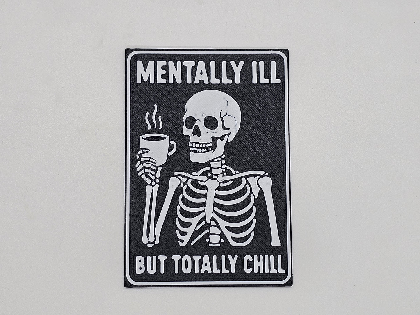 Black and white Mentally Ill but Totally Chill skeleton coffee magnet