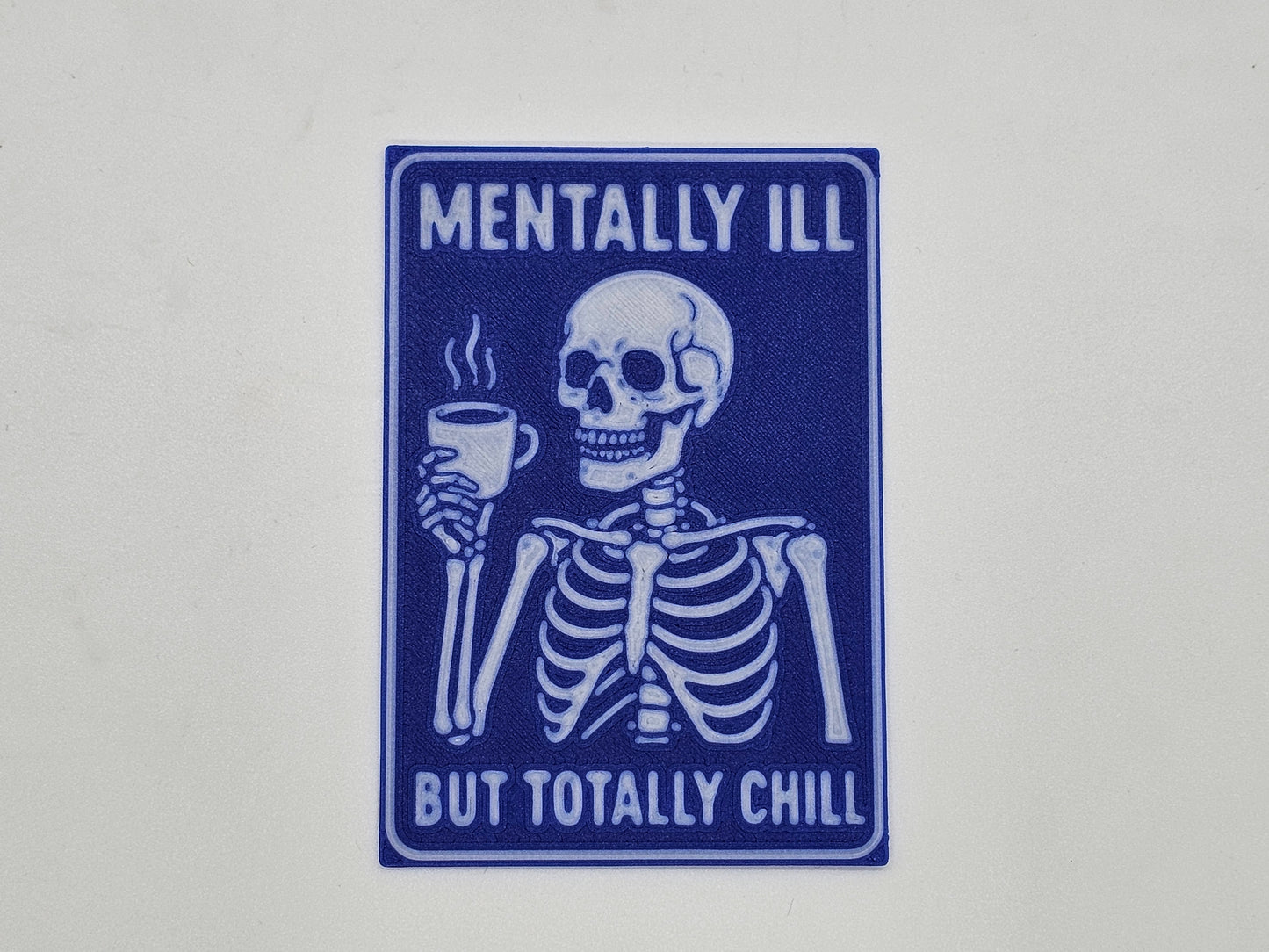 Blue and white Mentally Ill but Totally Chill skeleton coffee magnet