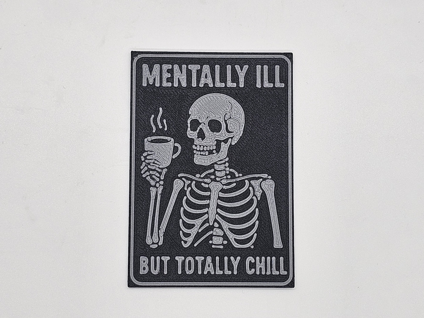 Charcoal and gray Mentally Ill but Totally Chill skeleton coffee magnet