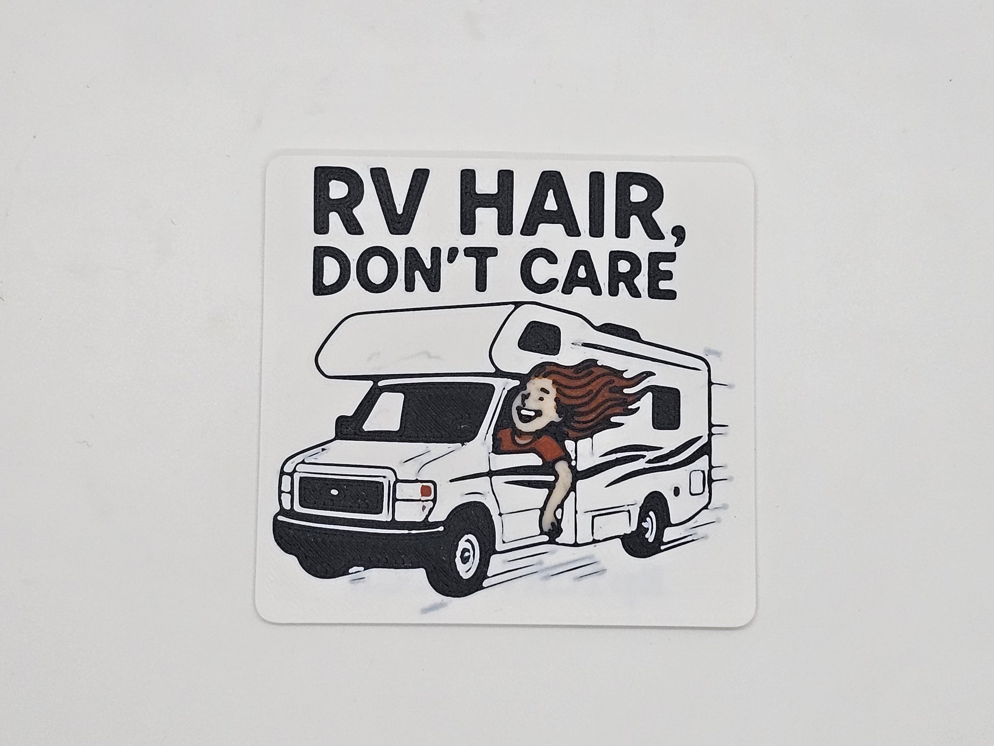 White, black, and brown RV Hair Don't Care Class C camper magnet