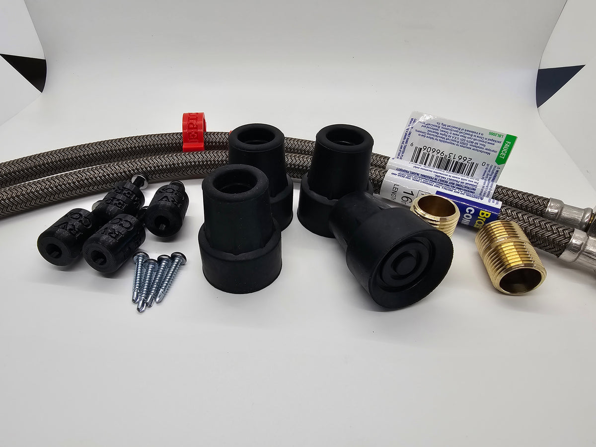 Close-up of RV water pump silencer feet, mounting adapters and screws with braided flex hoses and brass fittings.