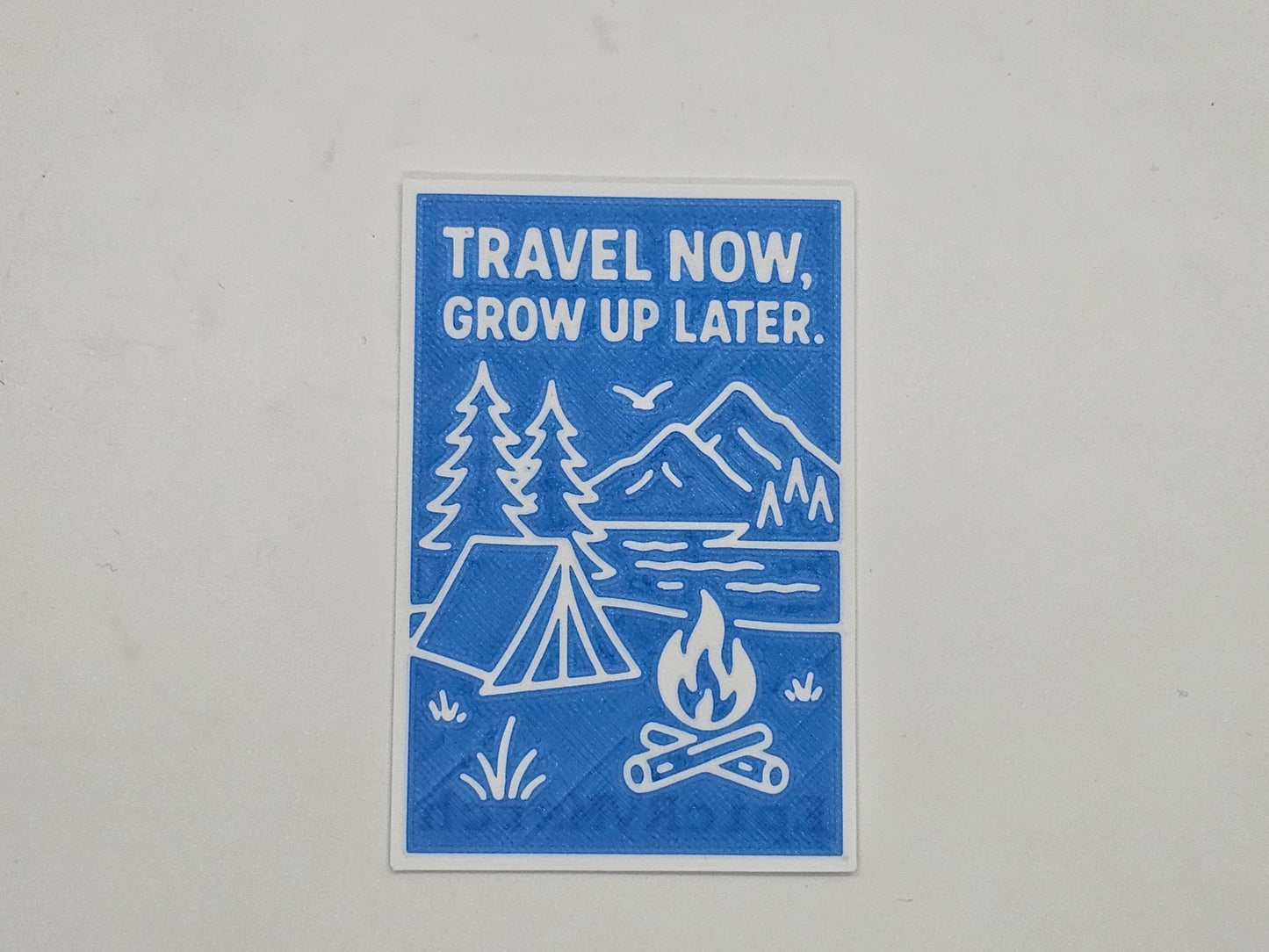 Blue and white Travel Now Grow Up Later camping magnet