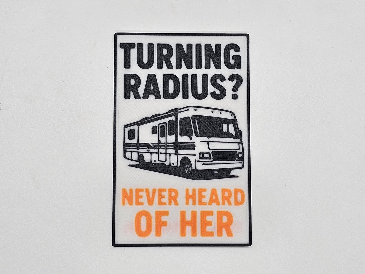 White, black, and orange Turning Radius? Never Heard of Her Class A RV magnet